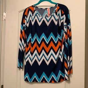 Blue, orange, and white chevron pattern top